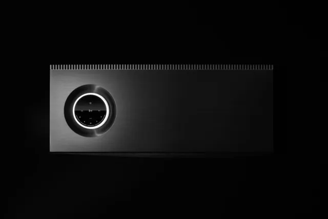 Naim Mu:So circular speaker product shot, minimal, photographic, dark