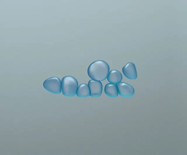 Translucent blue pebble cluster render, 3d-render, minimal, light
