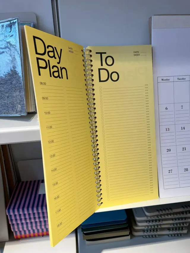 Bright yellow day planner stationery system, minimal, playful, warm