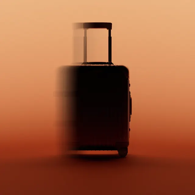 RIMOWA luggage product photography with warm monochromatic background, photographic, minimal, warm