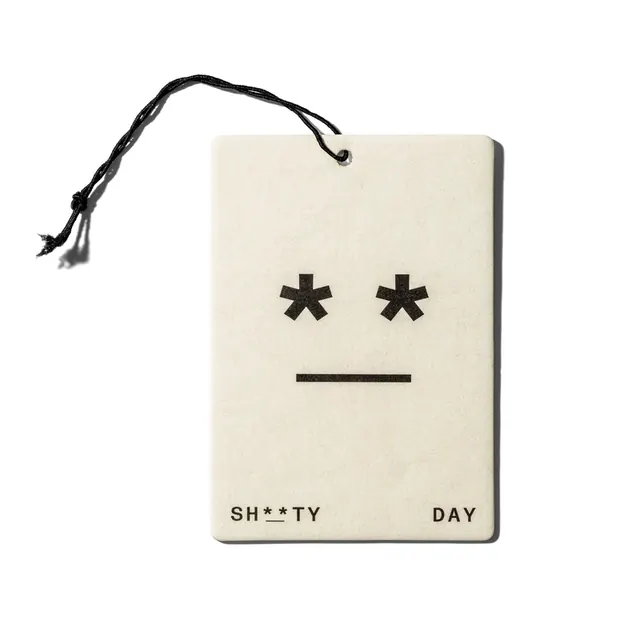 ASCII-art hang tag with deadpan mood, minimal, brutalist, light