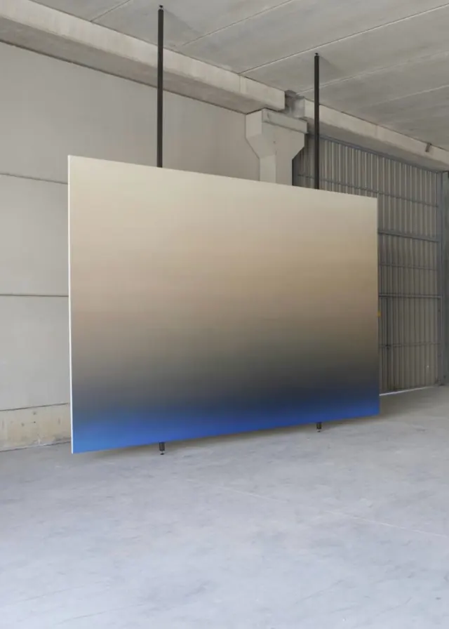Gradient color-field canvas in industrial space, minimal, geometric, gradient