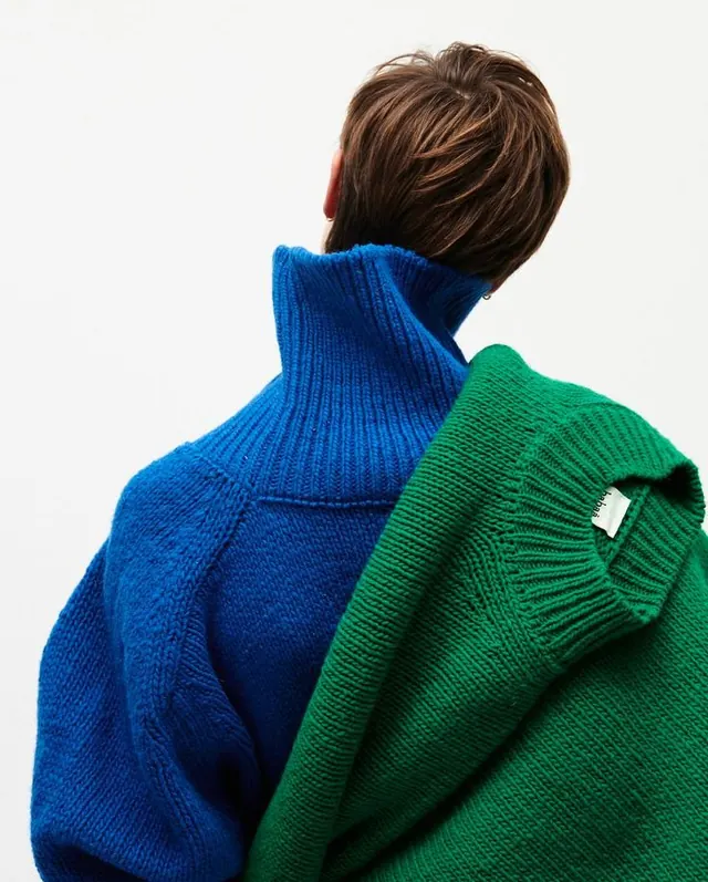 Color-blocked knitwear in blue and green, photographic, cool