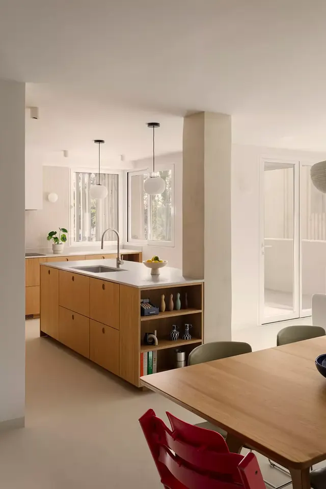 Warm minimalist kitchen interior, light-mode, minimal, warm