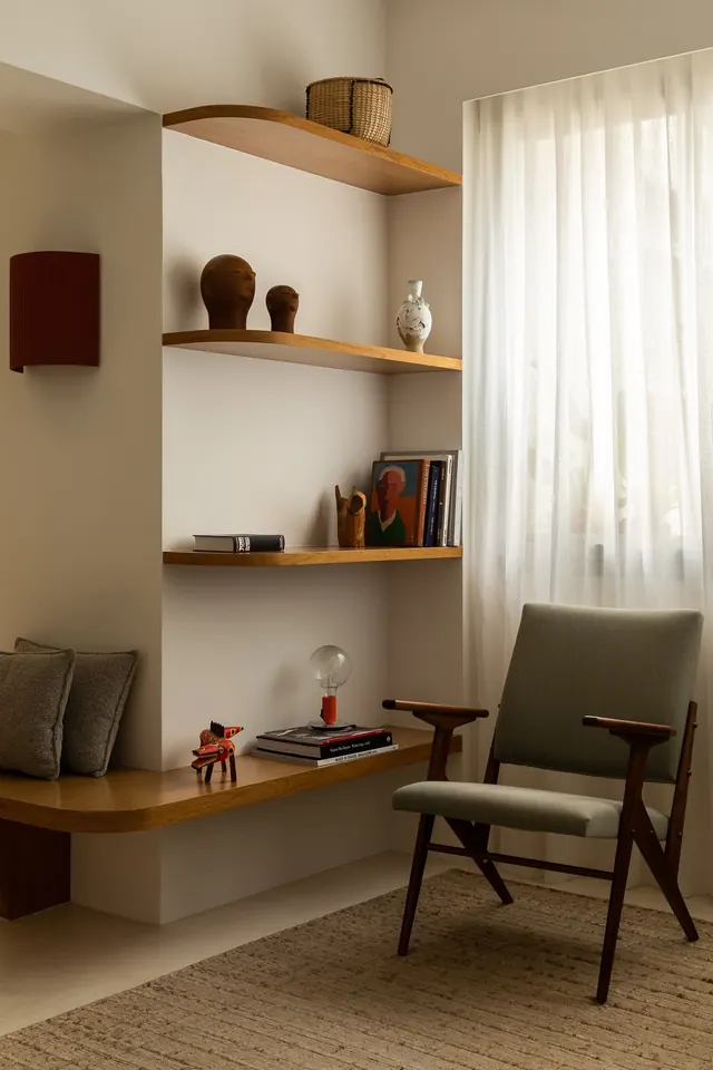 Mid-century modern study with floating wood shelving, minimal, organic, warm