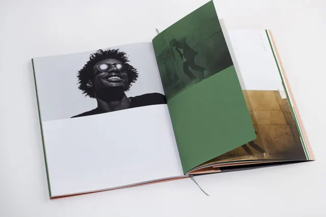 Editorial book spread with photography and color blocking, editorial, boxed, monochrome