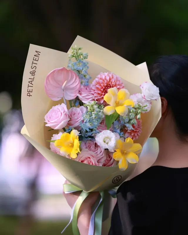 PETAL&STEM colorful mixed-bouquet flower packaging, photographic, minimal, warm