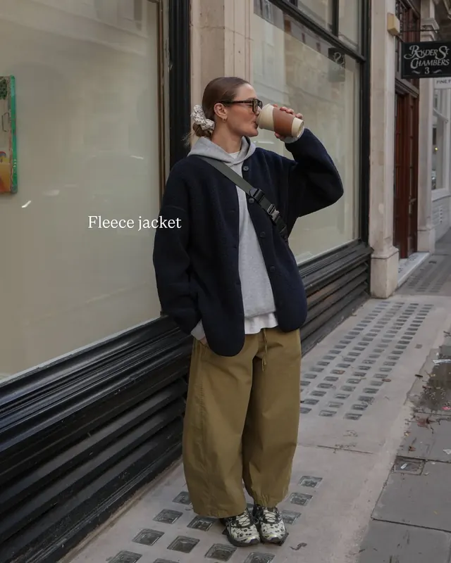 Layered street style photograph with serif label, photographic, minimal, dark