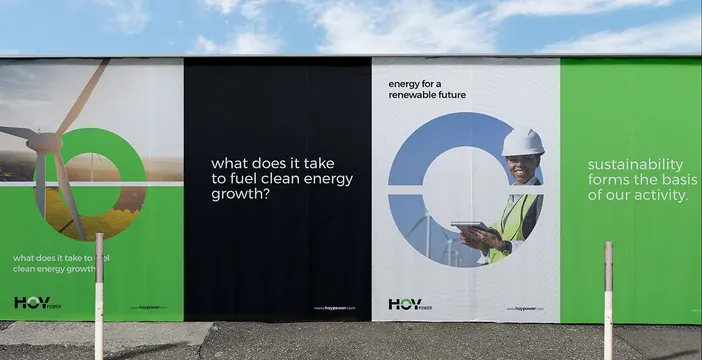 Renewable energy segmented signage with photography cutouts, corporate-clean, minimal, light
