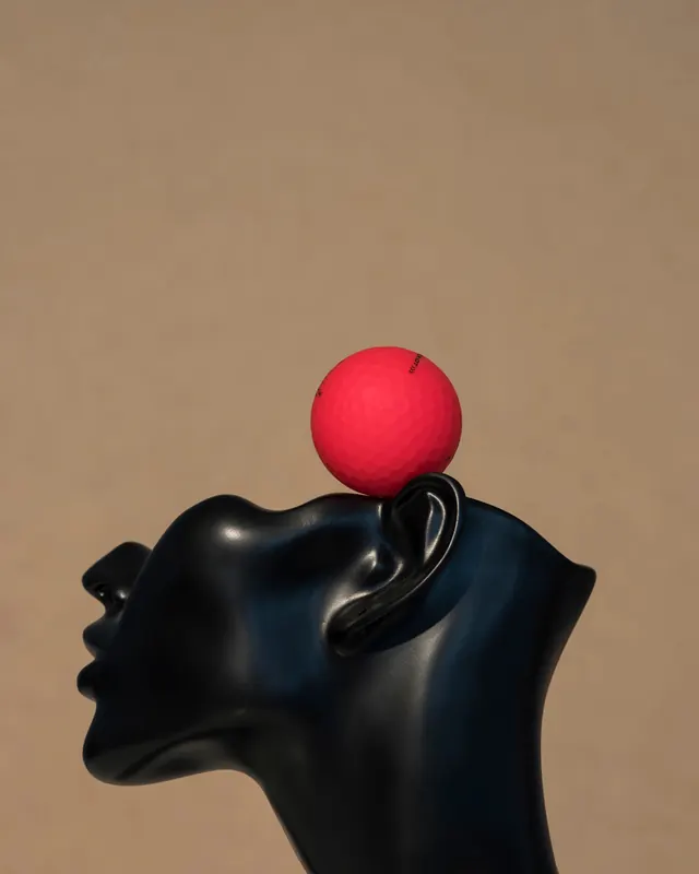 Sculptural Head with Red Sphere, minimal, abstract, high-contrast