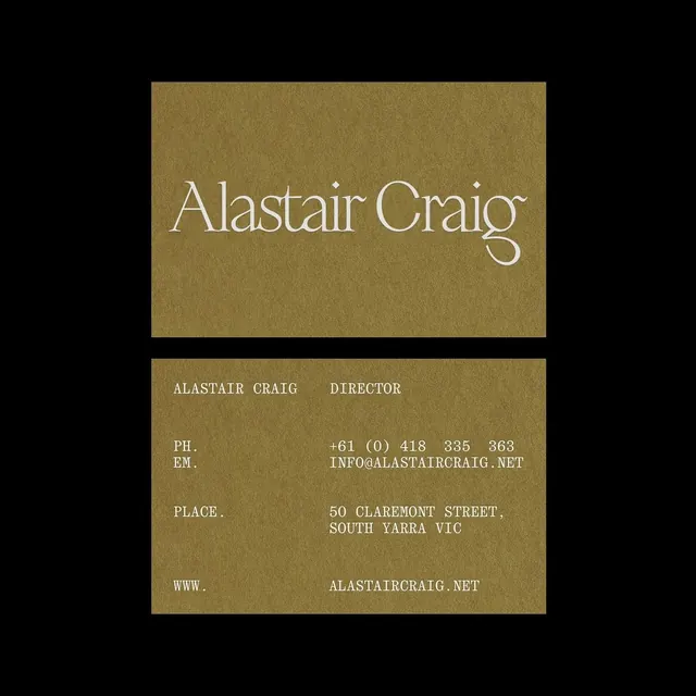 Kraft business card with serif type on earthy field, minimal, corporate-clean, light