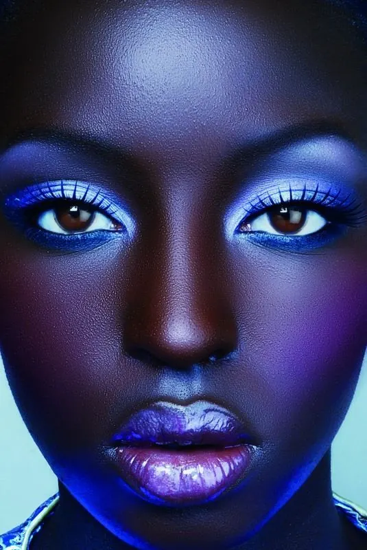 Stylized Portrait with Blue and Purple Tones, gradient-heavy, abstract, vibrant