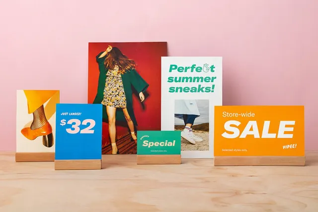 Retail sale signage with dimensional cards on wood blocks, playful, flat, neon