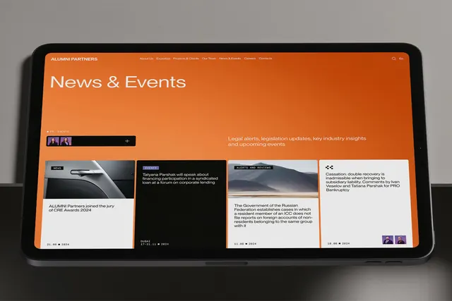 Burnt-orange accent news feed on tablet, corporate-clean, minimal, warm