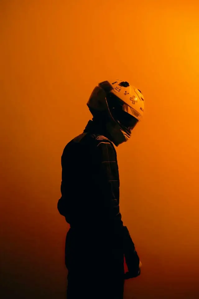 Silhouette Portrait in Orange Glow, minimal, abstract, vibrant