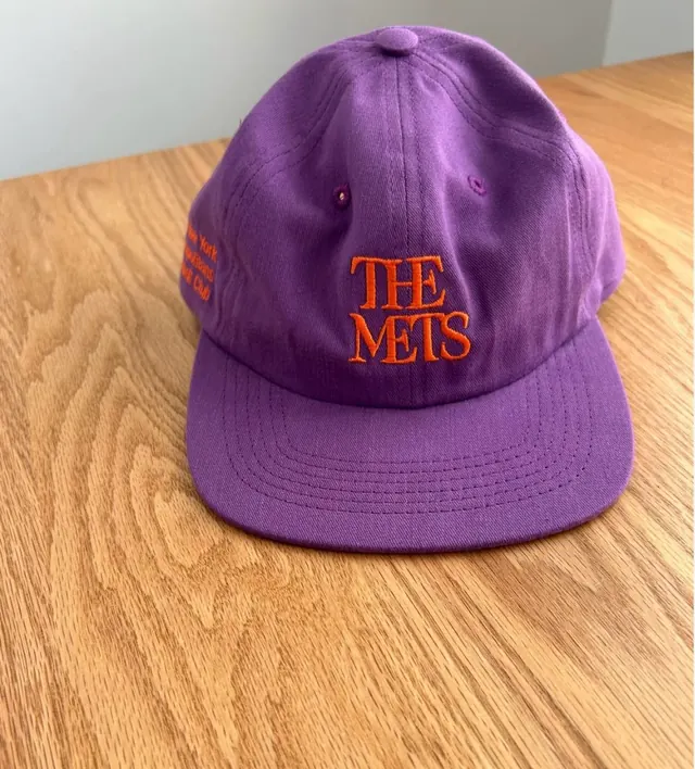 Mets baseball cap embroidery, playful, vibrant