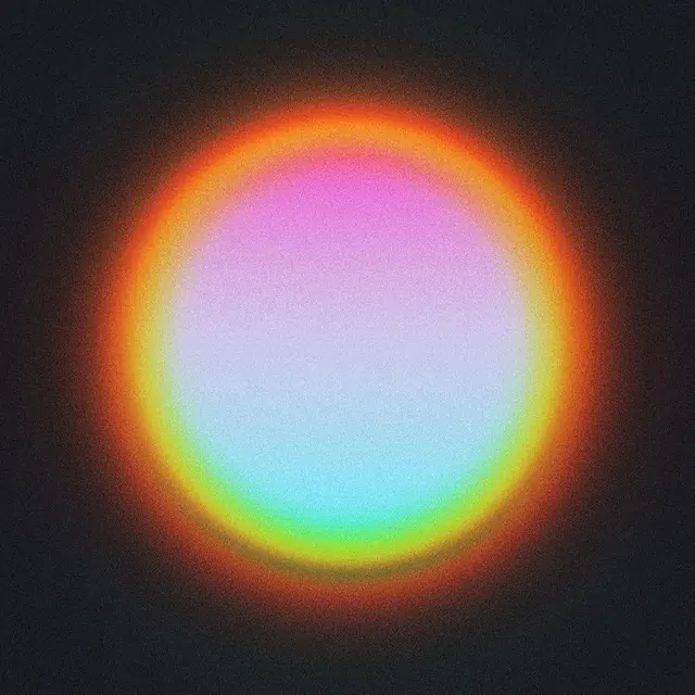 Radial gradient orb with warm-to-cool spectrum glow, gradient-heavy, abstract, dark