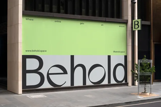 Behold storefront with split-color facade, minimal, geometric, light