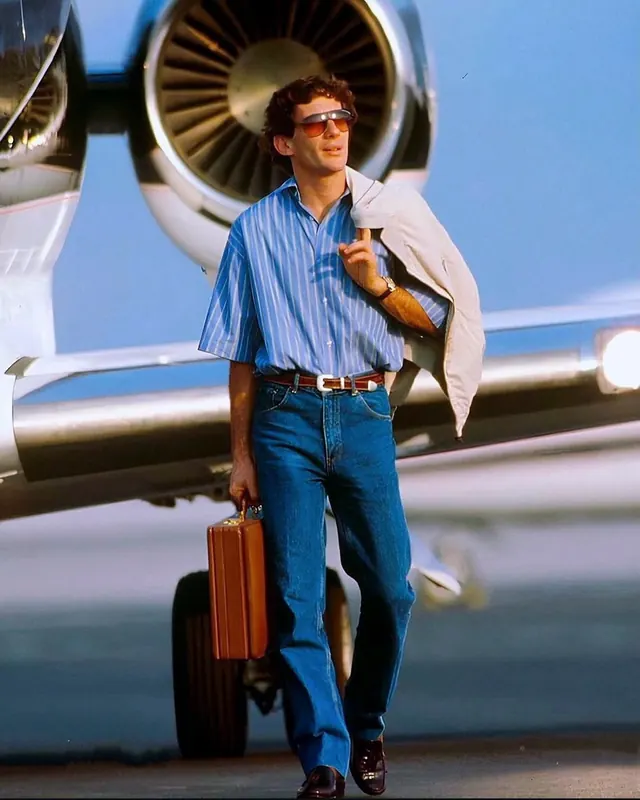 Man with Suitcase in Front of Airplane, photographic, vibrant