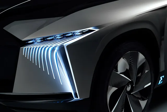 Futuristic car headlight closeup, minimal, technical, dark