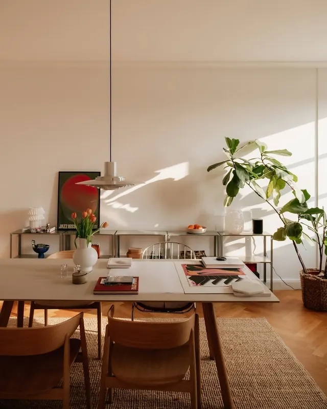 Minimalist workspace interior with warm tones and natural light, minimal, photographic, warm