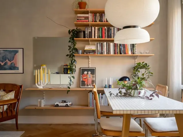 Warm mid-century studio with floating shelves and plants, photographic, organic, warm