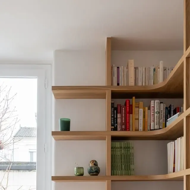 Warm-neutral wooden bookshelf interior styling, minimal, organic, warm