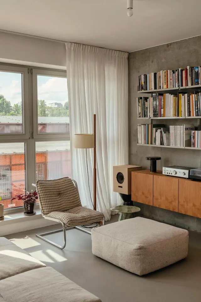 Modern minimalist interior with library wall, light-mode, minimal, light