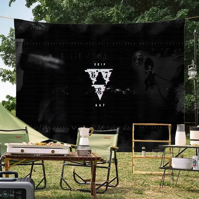 EKIP geometric logo system on event backdrop, minimal, brutalist, dark