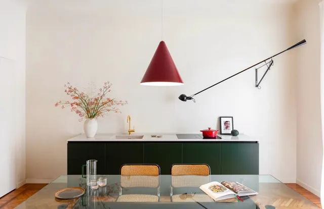 Styled dining interior with botanical accent, minimal, photographic, muted