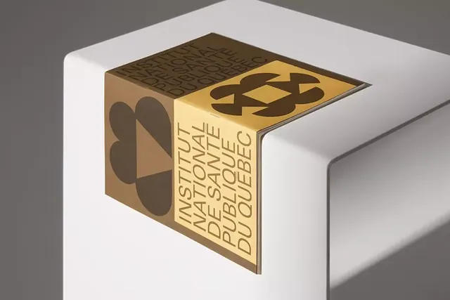 Isometric 3D box with gold and geometric pattern, minimal, corporate-clean, light