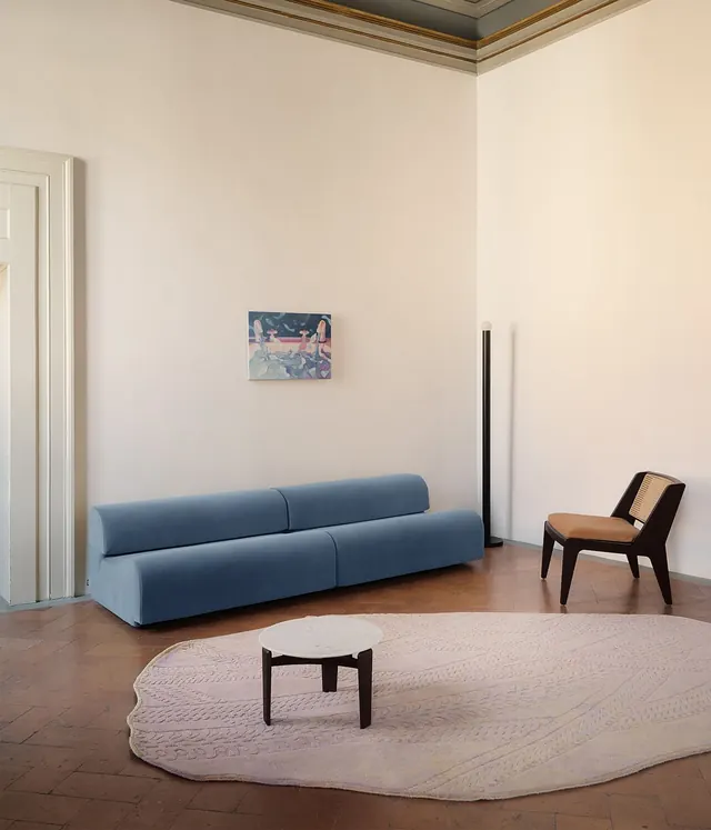 Minimalist interior with blue modular sofa, minimal, photographic, dark