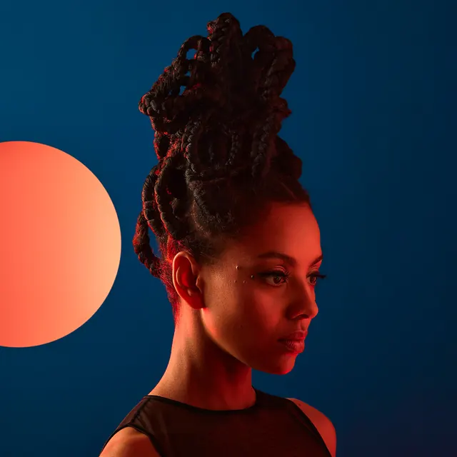 Portrait of a Woman with Sculpted Hair, photographic, high-contrast