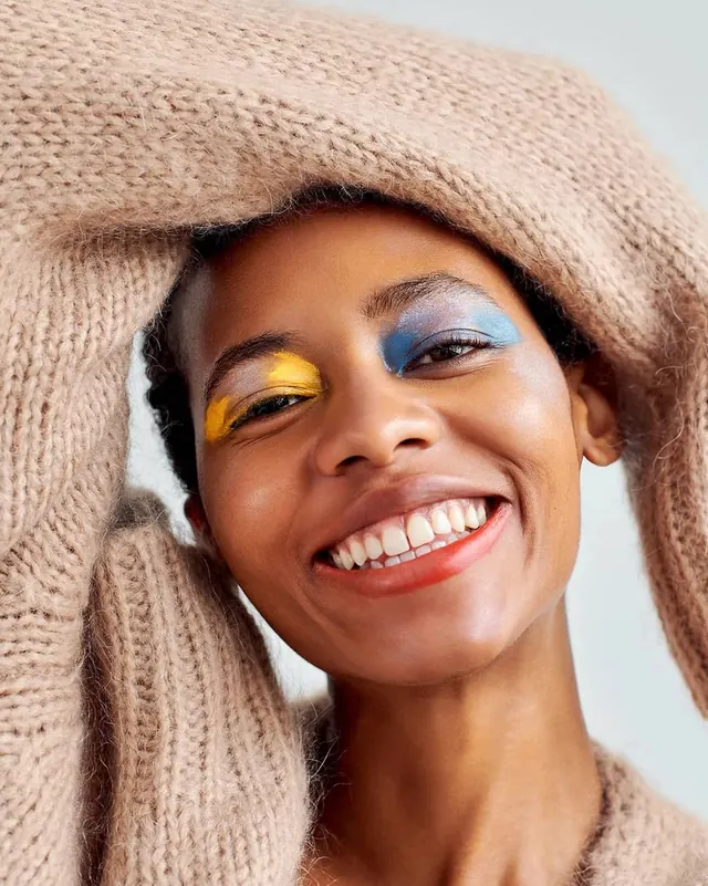 Woman with Yellow Eye Makeup, photographic, organic, vibrant