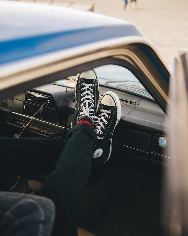Sneaker in Car Interior, photographic, organic, high-contrast
