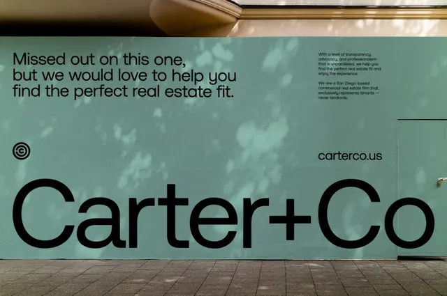 Carter+Co real estate storefront signage, minimal, corporate-clean, muted