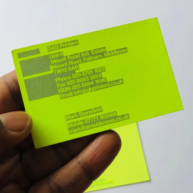 Neon-yellow business card with green-on-yellow text, minimal, corporate-clean, vibrant