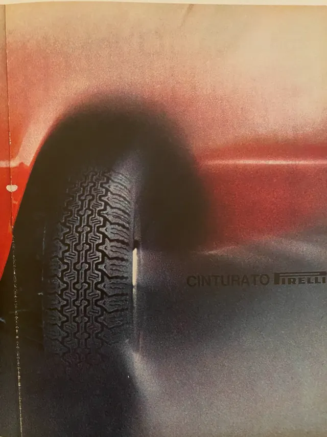 Vintage car tire textural detail shot, photographic, technical, dark