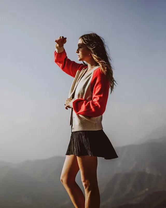 Woman in Red Jacket and Skirt, photographic, organic, vibrant