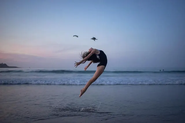 Woman Diving into Ocean, photographic, minimal, muted