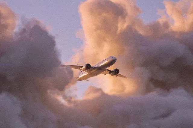 Airplane in Clouds, photographic, organic, warm