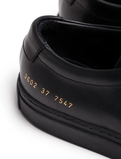 Black Leather Shoe with Gold Typography, minimal, luxury, dark