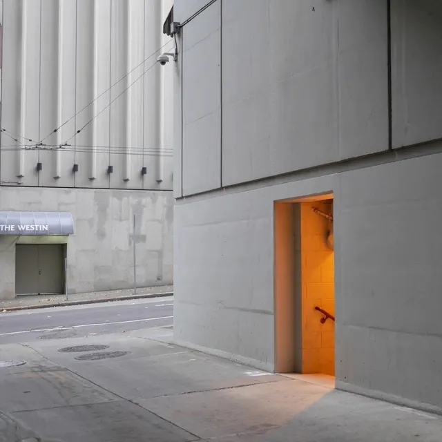 Modernist Architecture with Orange Portal, minimal, brutalist, muted