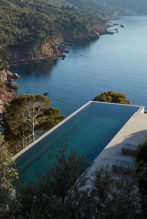 Infinity Pool Overlooking Coastal Bay, luxury, photographic, cool