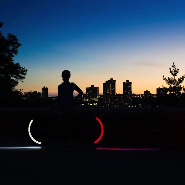Silhouette of a Person in a Cityscape, minimal, photographic, dark