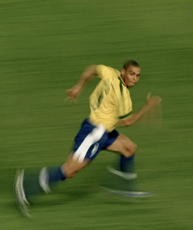Soccer Player in Action, photographic, vibrant