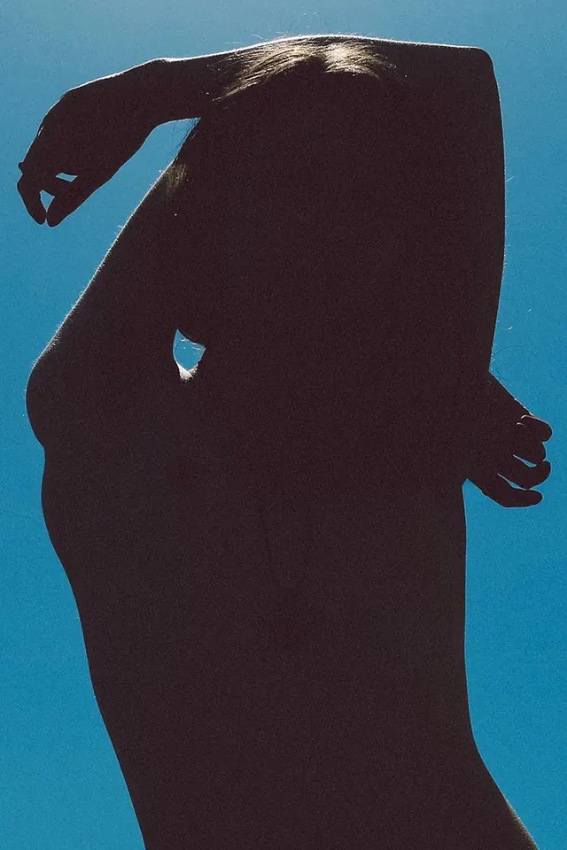 Silhouette of a Person in Blue Light, minimal, photographic, dark