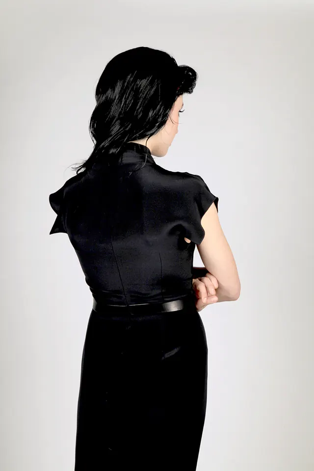Woman in Black Blouse and Trousers, minimal, photographic, dark