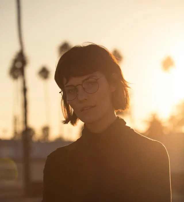 Portrait of a Woman in Sunset Light, photographic, organic, warm