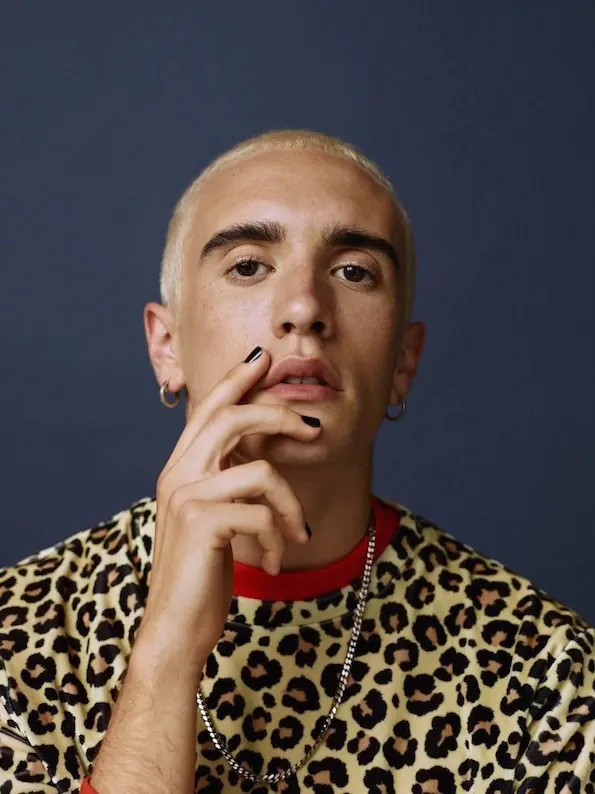 Portrait of a Man in Leopard Print, photographic, luxury, high-contrast